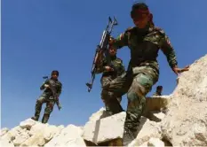  ?? REUTERS ?? Kurdische Kämpferinn­en in den iranischen Bergen.