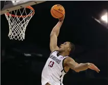  ?? STEPH CHAMBERS - GETTY IMAGES ?? San Diego State’s Jaedon Ledee dunks during Sunday night’s NCAA Tournament victory over Yale. The win sets up a rematch with Uconn.