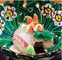  ??  ?? Fresh sashimi is presented beautifull­y in an exquisite salad bowl