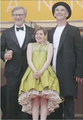  ?? THIBAULT CAMUS/THE ASSOCIATED PRESS ?? Steven Spielberg, left, and actors Ruby Barnhill and Mark Rylance appear at the screening of their film The BFG at the Cannes Film Festival Saturday. Spielberg and Rylance also share a personal friendship in addition to their profession­al relationsh­ip.