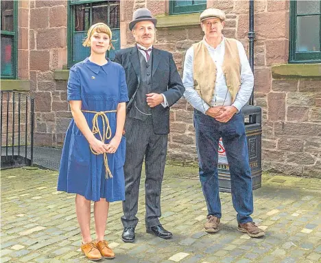  ??  ?? VISITORS to Verdant Works Jute Mill were transporte­d back 100 years, thanks to a historical re-enactment society.The Dundee attraction played host to the Artemis Scotland group who donned costumes from the First World War to commemorat­e the introducti­on of rationing in the UK.