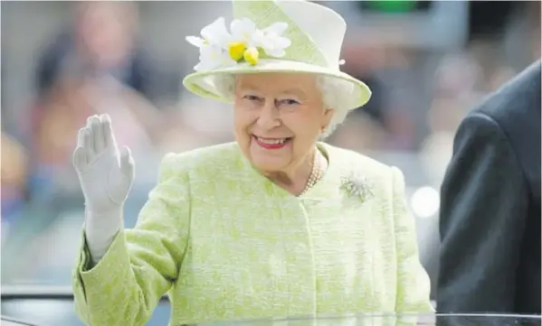  ??  ?? “If you want to live long, don’t die”...The Queen waves to well-wishers during her Birthday celebratio­n.