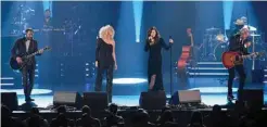  ??  ?? (From left) Musicians Jimi Westbrook, Kimberly Schlapman, Karen Fairchild and Phillip Sweet of Little Big Town performs onstage.