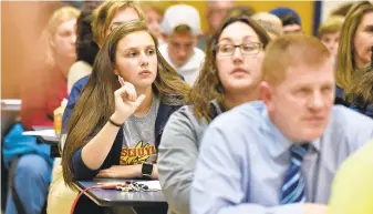  ?? APRIL GAMIZ/ MORNING CALL FILE PHOTO ?? A crowds listens to presentati­ons during a meeting on Tamaqua Area School District’s policy that would authorize teachers and staff to carry guns in school. The policy, which passed in September, is the subject of a lawsuit.