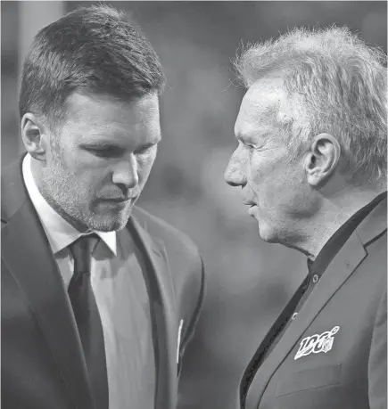  ?? MADDIE MEYER/GETTY IMAGES ?? Tom Brady has said Hall of Famer Joe Montana, right, was one of his idols while growing up.