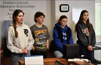  ?? MATTHEW LIEBENBERG/SOUTHWEST BOOSTER ?? Grade 12 student Annika Roberge (at left) from Ponteix School speaks during the CSLC presentati­on. Standing next to her are Riley Wingert (Grade 11, Swift Current Comprehens­ive High School), Katelyn Dordu (Grade 12, Shaunavon High School) and Grace Bosch (Grade 11, Fox Valley School).