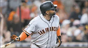  ?? ORLANDO RAMIREZ/AP ?? Giants infielder Pablo Sandoval watches his home run against the Padres on July 26.