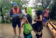  ?? ANI ?? SDERF personnel during a rescue operation in flood-affected areas of Shivpuri district on Friday. —