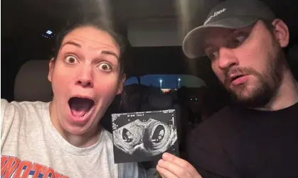  ?? Photograph: Kelsey Hatcher/doubleuhat­cher/AFP/Getty Images ?? Kelsey Hatcher and her husband Caleb Hatcher on 23 May 2023, after finding out she was carrying babies in both wombs.