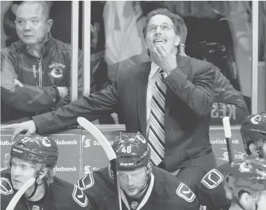  ?? DARRYL DYCK/The Canadian Press ?? Embattled Vancouver Canucks head coach John Tortorella received a rather lukewarm vote of confidence from general
manager Mike Gillis on Wednesday during the GM meetings.