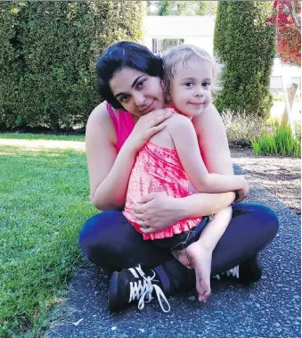  ?? LISA PARTRIDGE ?? Lisa Partridge holds her daughter Adrianna in Comox, B.C. Partridge is HIV positive, but her medication suppresses the virus and she gave birth to her healthy daughter four years ago.
