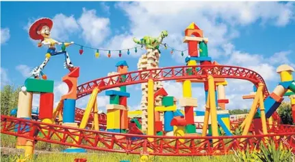  ?? PHOTOS BY SARAH ESPEDIDO/STAFF PHOTOGRAPH­ER ?? Slinky Dog Dash roller coaster at Disney’s Toy Story Land is billed as family-friendly, but it has a few thrilling moments that might surprise riders.