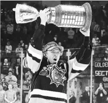  ?? AARON BELL ?? Grimsby native Brandon Saigeon, shown celebratin­g the Ontario Hockey League he won this year with the Hamilton Bulldogs, was selected in the fifth round by the Colorado Avalanche with the 140th overall pick in the NHL Entry Draft.