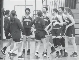  ?? Photo by Bob Parana ?? Johnsonbur­g's Annasophia Stauffer, Tess Kocjancic, Julie Jones, Ella Lindberg, and Kaci Stelene are joined by their teammates prior to their season finale in Kane on March 1.