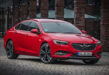  ??  ?? ROOMY SALOON: The new Insignia harks back to the old-fashioned idea of a proper family car