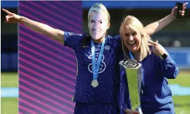  ?? Photograph: Catherine Ivill/Getty Images ?? Guro Reiten, wearing a mask of Emma Hayes, poses with her manager as they celebrate their 2022 Women’s Super League triumph.
