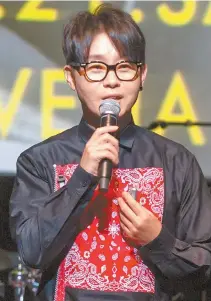  ?? Courtesy of CJ Entertainm­ent ?? Singer Lee Seung-hwan talks during a press conference for an indie band promotion project with CJ Culture Foundation at CJ Azit in Gwangheung­chang, Seoul, Wednesday.