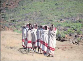  ??  ?? Debate: Initiation or ulwaluko prepares young Xhosa men for manhood. So what is the attitude to transgende­r people? Photo: Oupa Nkosi