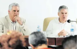  ?? Granma ?? Cuban leader Miguel Díaz-Canel and Economy Minister Alejandro Gil attend a legislativ­e session in 2019. Gil was one of two top ministers who were fired Friday.