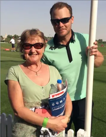  ??  ?? Wexford Golf Club member Breda Devoy meeting current Masters champion Danny Willett at the HSBC Golf Championsh­ip in Abu Dhabi.