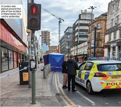  ?? ?? A cordon was placed around the site of the incident in Manchester city centre yesterday