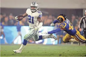  ?? GARY A. VASQUEZ/USA TODAY SPORTS ?? The Cowboys’ Ezekiel Elliott, eluding Rams safety John Johnson, rushed for 1,434 yards and six TDs in the 2018 regular season.