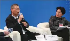  ??  ?? Zhang Yuge, director of the Center for Hong Kong and Macao Studies at think tank the China Developmen­t Institute, says financial institutio­ns’ products remain competitiv­e.
