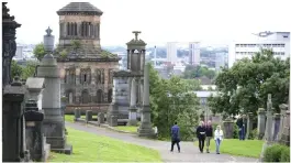  ??  ?? Douglas Stuart, main picture, grew up in Sighthill, above right, and loves visiting the Necropolis, above, and far right, his award- winning book, Shuggie