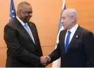  ?? Lloyd Austin meets Benjamin Netanyahu. Photograph: Xinhua/Rex/Shuttersto­ck ??