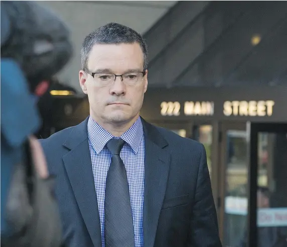  ?? ARLEN REDEKOP/PNG ?? Former RCMP inspector Tim Shields leaves court a free man on Wednesday after a judge ruled he wasn’t guilty of sexually assaulting a civilian co-worker in 2009. The judge wasn’t convinced an encounter in a unisex bathroom was not consensual.