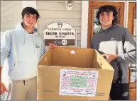  ?? Justin Keller / Contribute­d photo ?? Ridgefield High School juniors Will Hanna, left, and Justin Keller are organizing a sports equipment drive to benefit families served by the Saint Joseph Parenting Center in Stamford.