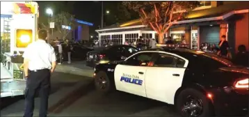  ?? OC HAWK ?? In this screen grab from OC Hawk video, paramedics and Buena Park police responded to fights that broke out early Saturday night at Knott's Berry Farm. The amusement park, usually open until 11p.m. on Saturdays, closed early at 8p.m.