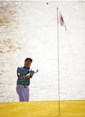  ?? JOHN WOIKE/HARTFORD COURANTVIA­AP ?? BubbaWatso­n lofts a shot high into the air on the 15th hole.