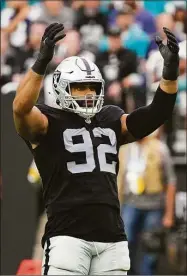  ?? Rick Scuteri / Associated Press ?? Former Raiders defensive end Solomon Thomas officially signed with the Jets on Wednesday.