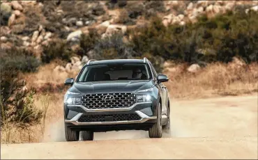  ?? DREW PHILLIPS/ COURTESY OF HYUNDAI MOTOR AMERICA VIA AP ?? The 2021 Santa Fe with new styling, upgraded available engines and a lot of equipment at an attractive price.