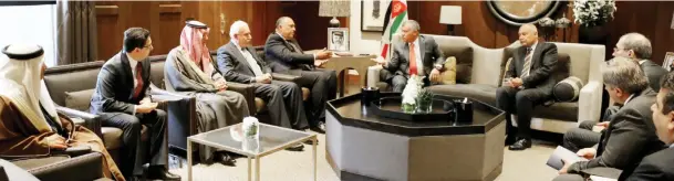 ??  ?? Jordan’s King Abdullah in a meeting with foreign ministers of some Arab countries in Amman on Saturday. (AFP)