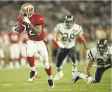  ?? Deanne Fitzmauric­e / The Chronicle ?? 49ers running back Ricky Watters scored three touchdowns against the Chargers in Super Bowl XXIX, a 4926 win.