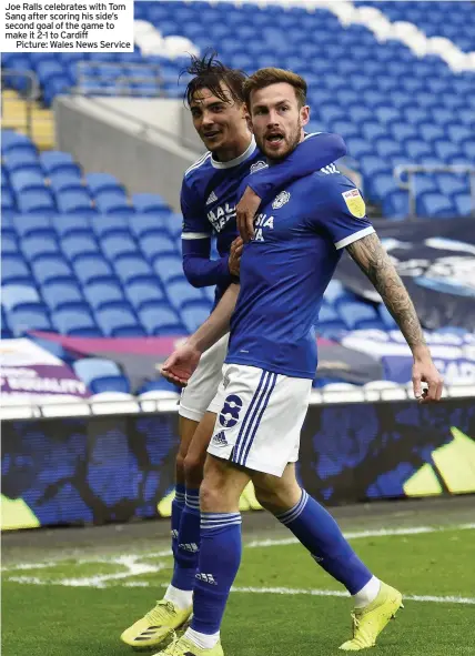  ??  ?? Joe Ralls celebrates with Tom Sang after scoring his side’s second goal of the game to make it 2-1 to Cardiff
Picture: Wales News Service