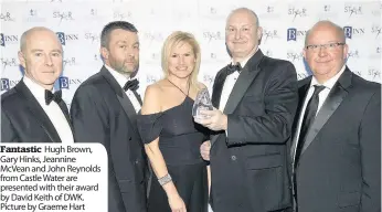  ??  ?? Fantastic Hugh Brown, Gary Hinks, Jeannine McVean and John Reynolds from Castle Water are presented with their award by David Keith of DWK. Picture by Graeme Hart