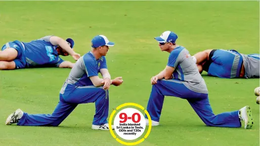  ?? PTI ?? Australian captain Steve Smith (right) and vice-captain David Warner stretch during a practice session at the MAC Stadium in Chennai on Friday. —