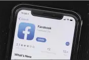  ?? AMR ALFIKY — THE ASSOCIATED PRESS ?? The Facebook app is displayed on Apple’s App Store.