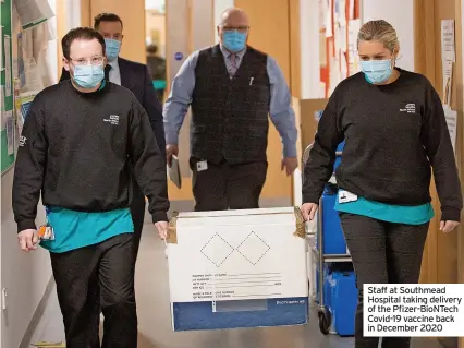  ?? ?? Staff at Southmead Hospital taking delivery of the Pfizer-BioNTech Covid-19 vaccine back in December 2020