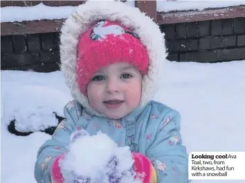  ??  ?? Looking coolava Toal, two, from Kirkshaws, had fun with a snowball