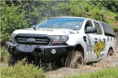  ?? ?? RUGGED TERRAIN: 4x4 tyre and shocks specificat­ions must go hand-in-hand with the types of terrain a vehicle has to negotiate on a frequent basis as demonstrat­ed during a Lindale Game Farm drive.