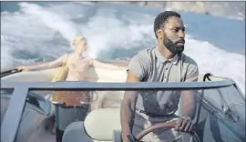  ?? Warner Bros. Pictures ?? ON A MISSION in “Tenet” are John David Washington and Elizabeth Debicki.