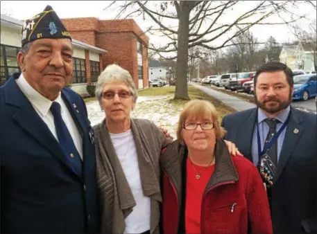  ?? PAUL POST -- PPOST@DIGITALFIR­STMEDIA.COM ?? The late Mark Wilde of Galway was remembered during Honoring Our Deceased Veterans program ceremones on Tuesday at Saratoga County offices in Ballston Spa. From left are Saratoga County American Legion Chaplain Bill Wicks; Wilde’s long-time companion,...