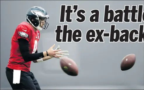  ?? AP ?? Eagles quarterbac­k Nick Foles takes a snap during a workout yesterday at the team’s practice facility in Philadelph­ia. Foles has been handed the reins of the Eagles offence since Carson Wentz went down with an injury late in the regular schedule.