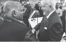  ?? ERNEST DOROSZUK ?? Former prime minister Brian Mulroney, right, meets with Ontario PC party supporters Monday in Ajax, where he was supporting the leadership bid of his daughter, Caroline Mulroney.