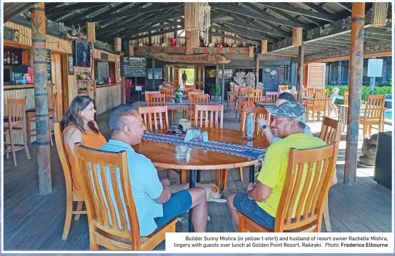  ?? Photo: Frederica Elbourne ?? Builder Sunny Mishra (in yellow t-shirt) and husband of resort owner Rachelle Mishra, lingers with guests over lunch at Golden Point Resort, Rakiraki.