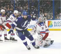  ?? BRUCE BENNETT/ GETTY IMAGES ?? Nikita Kucherov of the Tampa Bay Lightning celebrates after scoring on Igor Shesterkin of the New York Rangers during Game 4 of the Eastern Conference final Tuesday in Tampa, Fla.